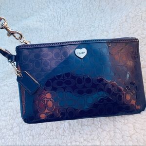 Coach liquid gloss medium purple wristlet
